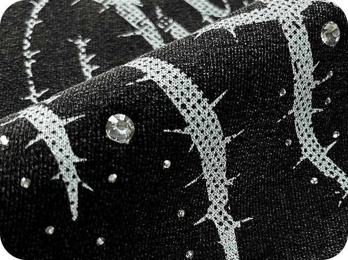 Close-up of a heat-set rhinestone on the brushed fleece