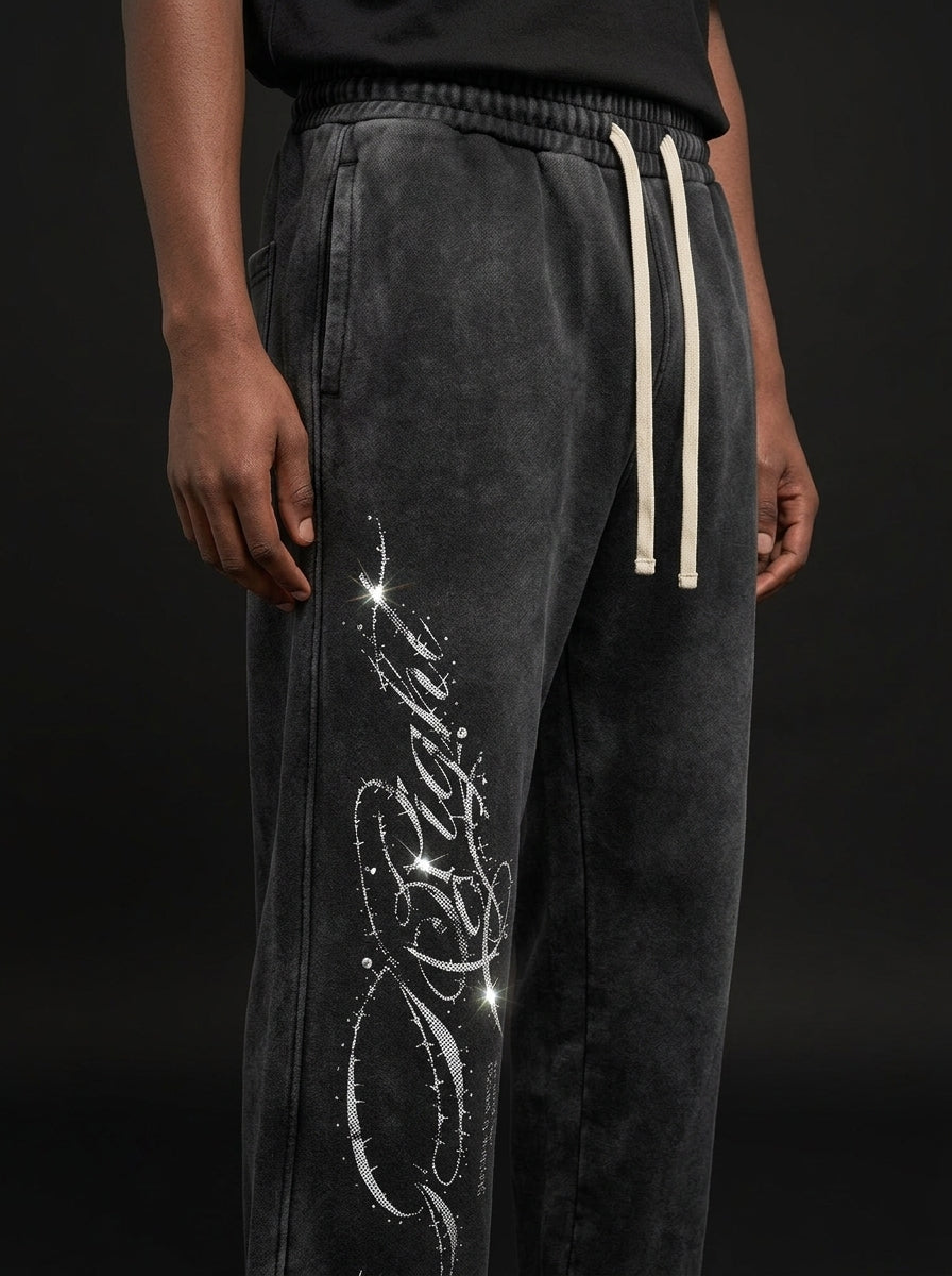 Close-up of the Be Right script print and rhinestones on the left leg